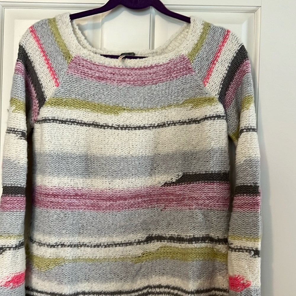 Free People warm cozy multi colored sweater. Excellent condition.